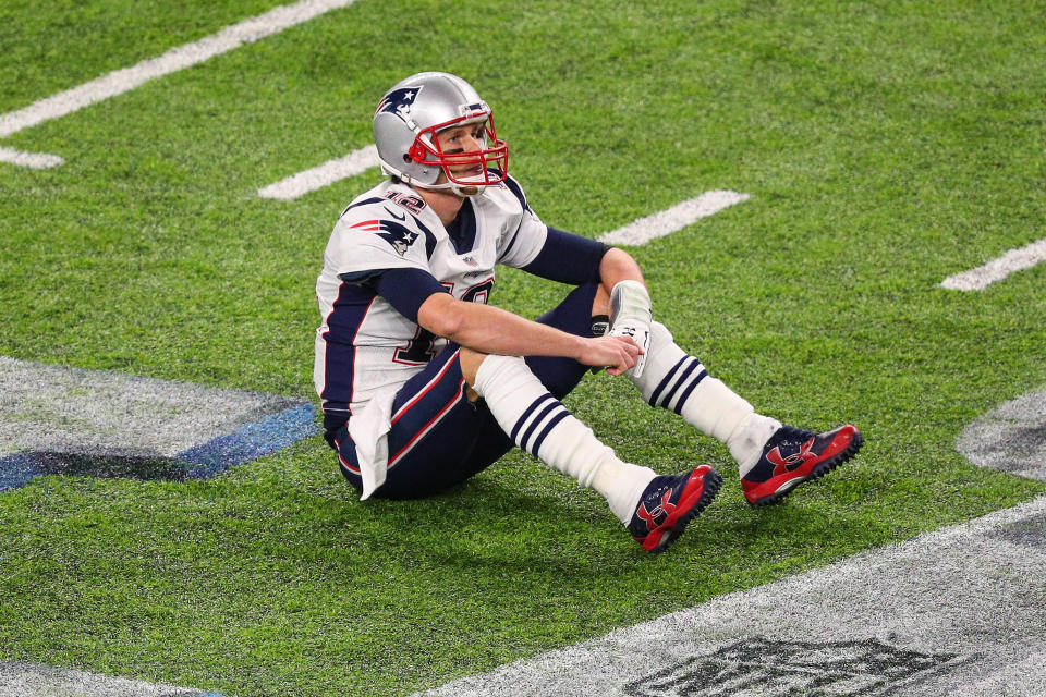 Tom Brady sits on the field after losing a fumble during the fourth quarter of Super Bowl LII. (Photo: Icon Sportswire via Getty Images)