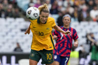 Matilda's Emily van Egmond heads the ball during the international soccer match between the United States and Australia at Stadium Australia in Sydney, Saturday, Nov. 27, 2021. (AP Photo/Mark Baker)