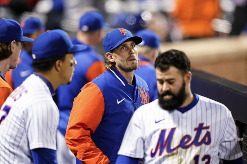 New York Mets' Jeff McNeil looks at the scoreboard during the fourth inning of the team's baseball game against the Washington Nationals on Wednesday, Oct. 5, 2022, in New York. (AP Photo/Frank Franklin II)