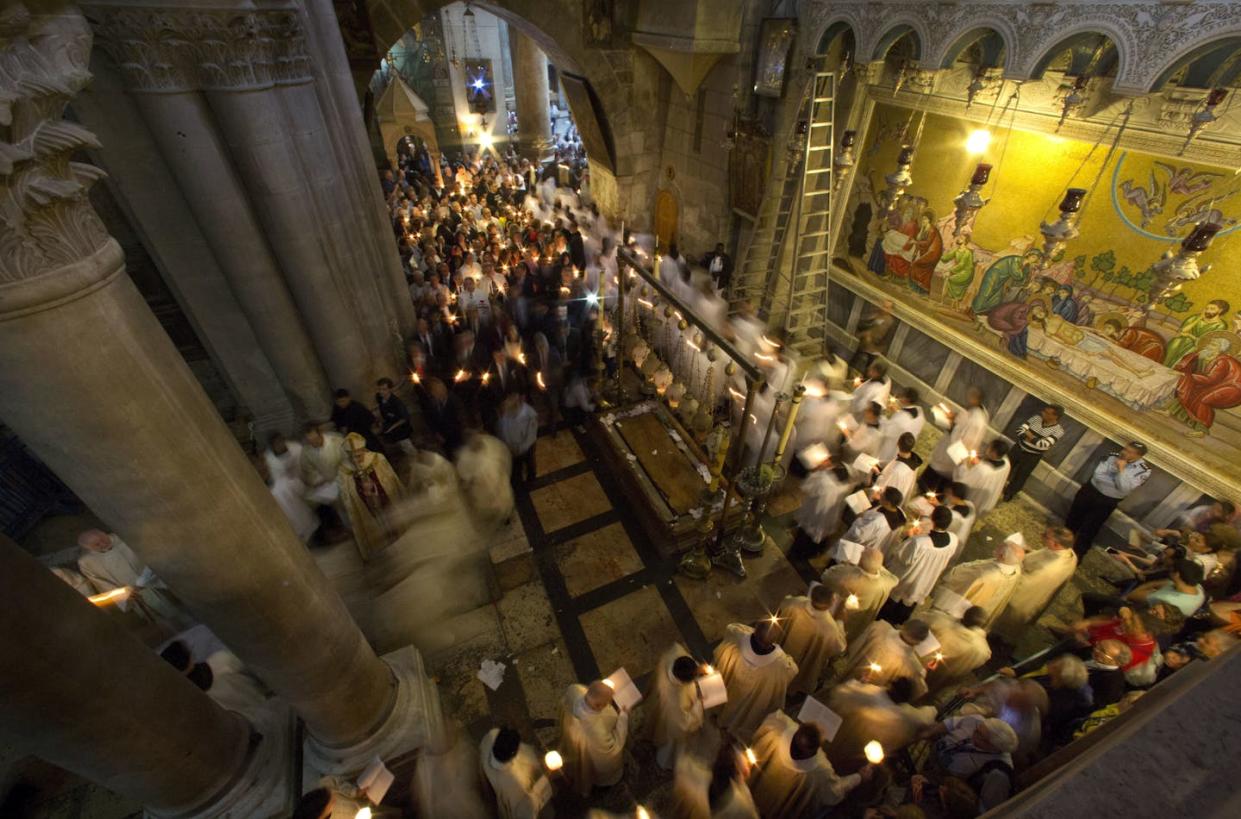 A procession at the Church of the Holy Sepulchre, believed by many Christians to be the site of the crucifixion and burial place of Jesus Christ. <a href="https://newsroom.ap.org/detail/IsraelPalestiniansEaster/d33a91bd48b94dd7b7cae10a29bdeef0/photo?Query=%20Church%20of%20the%20Holy%20Sepulchre%20easter&mediaType=photo&sortBy=&dateRange=Anytime&totalCount=901&digitizationType=Digitized&currentItemNo=29&vs=true&vs=true" rel="nofollow noopener" target="_blank" data-ylk="slk:AP Photo/Sebastian Scheiner;elm:context_link;itc:0;sec:content-canvas" class="link ">AP Photo/Sebastian Scheiner</a>