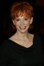 <p>As much as we loved Reba’s first pixie, we can't help but swoon over this cute little flipped ‘do from her appearance at the WB network party in 2002.</p>