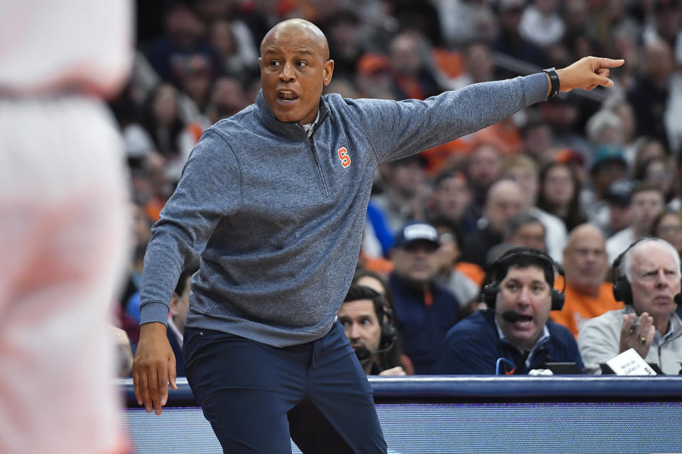 Syracuse head coach Adrian Autry gestures during the first half of an NCAA college basketball game against Pittsburgh in Syracuse, N.Y., Saturday, Dec. 30, 2023. (AP Photo/Adrian Kraus)