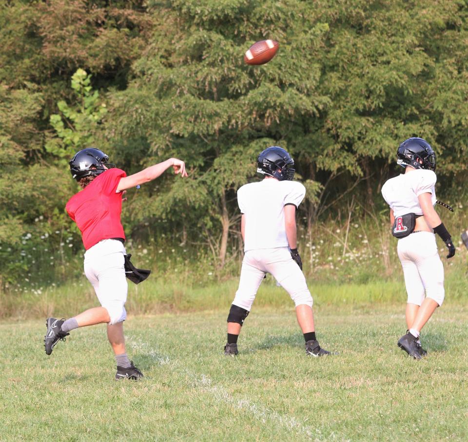 Rosecrans senior quarterback Brendan Bernath throws a pass during Wednesday's practice. Bernath is a four-year starter for the Bishops and provides leadership and experience on the field.