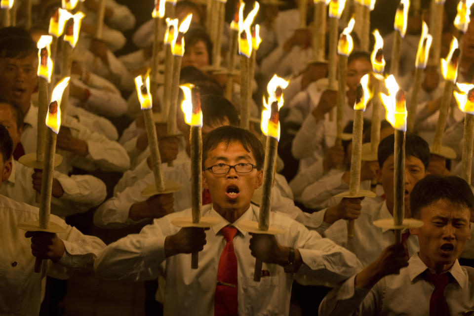 <p>North Korean students take part in a torch light march held in conjunction with the 70th anniversary of North Korea’s founding day celebrations in Pyongyang, North Korea, Monday, Sept. 10, 2018. (AP Photo/Ng Han Guan) </p>