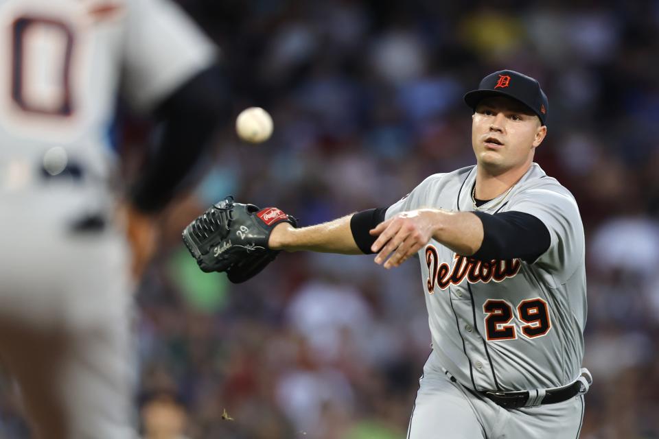 Detroit Tigers starting pitcher Tarik Skubal tosses to first baseman Spencer Torkelson on a groundout by Boston Red Sox's Rafael Devers during the third inning of a baseball game, Friday, Aug. 11, 2023, in Boston. (AP Photo/Michael Dwyer)