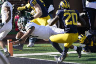 Michigan State running back Connor Heyward (11) crosses the goal line for a touchdown during the second half of an NCAA college football game against Michigan, Saturday, Oct. 31, 2020, in Ann Arbor, Mich. (AP Photo/Carlos Osorio)