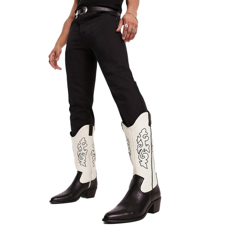 <p><a href="https://go.redirectingat.com?id=74968X1596630&url=https%3A%2F%2Fwww.asos.com%2Fus%2Fasos-design%2Fasos-design-western-heeled-boots-in-contrast-black-and-cream-leather%2Fprd%2F203902828%3Faffid%3D25902%26_cclid%3DGoogle_EAIaIQobChMIp6aV0Me5gAMVw_mUCR336AcFEAQYAiABEgJwZvD_BwE%26channelref%3Dproduct%2Bsearch%26mk%3Dabc%26ppcadref%3D11302983040%257C111197600375%257Cpla-294682000766%26cpn%3D11302983040%26gclid%3DEAIaIQobChMIp6aV0Me5gAMVw_mUCR336AcFEAQYAiABEgJwZvD_BwE%26gclsrc%3Daw.ds&sref=https%3A%2F%2F" rel="nofollow noopener" target="_blank" data-ylk="slk:Shop Now;elm:context_link;itc:0;sec:content-canvas" class="link ">Shop Now</a></p><p>Western Heeled Boots</p><p>$105.00</p><p>www.asos.com</p>