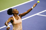 Venus Williams, of the United States, serves to Karolina Muchova, of the Czech Republic, during the first round of the U.S. Open tennis championships, Tuesday, Sept. 1, 2020, in New York.(AP Photo/Frank Franklin II)