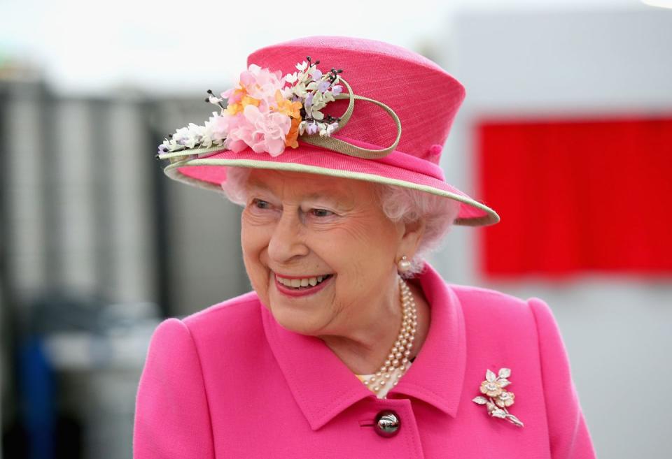 The Queen wears bright clothing so people can see her.