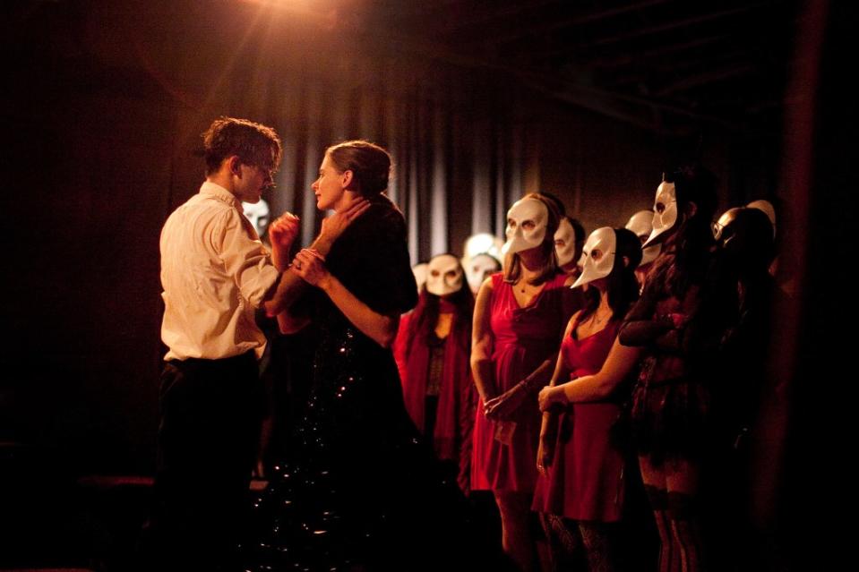 Guests famously must wear white masks for the duration of the show. Courtesy of the McKittrick Hotel