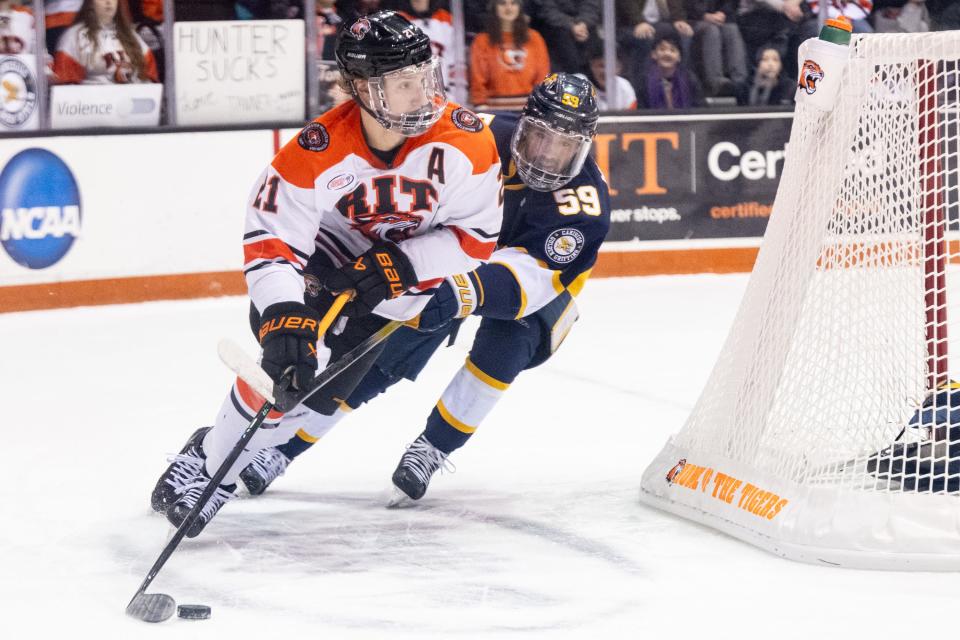 RIT's Carter Wilkie skates with the puck against Canisius on Jan. 16 at Gene Polisseni Center in Henrietta.