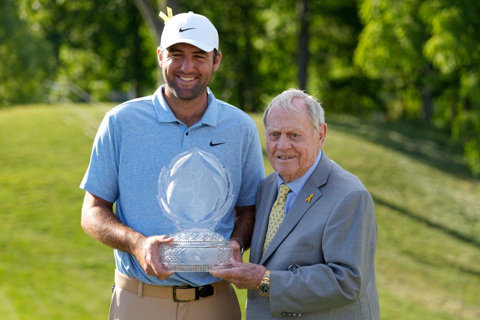 June 9: Scottie Scheffler, left, poses Hall of Fame golfer and tournament host Jack Nicklaus after winning the Memorial at Muirfield Village Golf Club in Dublin, Ohio.