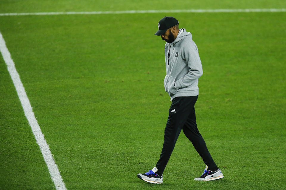 Montreal Impact head coach Thierry Henry exits the field after his team lost 3-1 to New York City FC during their MLS match, Saturday, Oct. 24, 2020, at Yankee Stadium in New York. (AP Photo/Eduardo Munoz Alvarez)