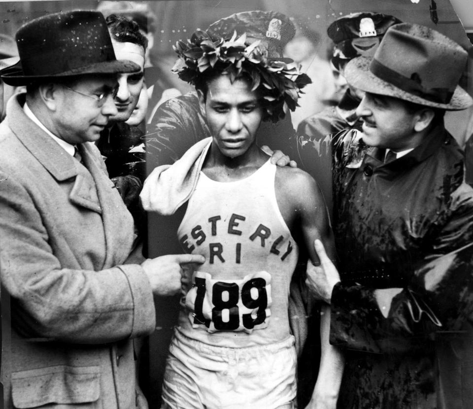 Tarzan Brown wears the olive branch wreath after winning his second Boston Marathon in 1939.