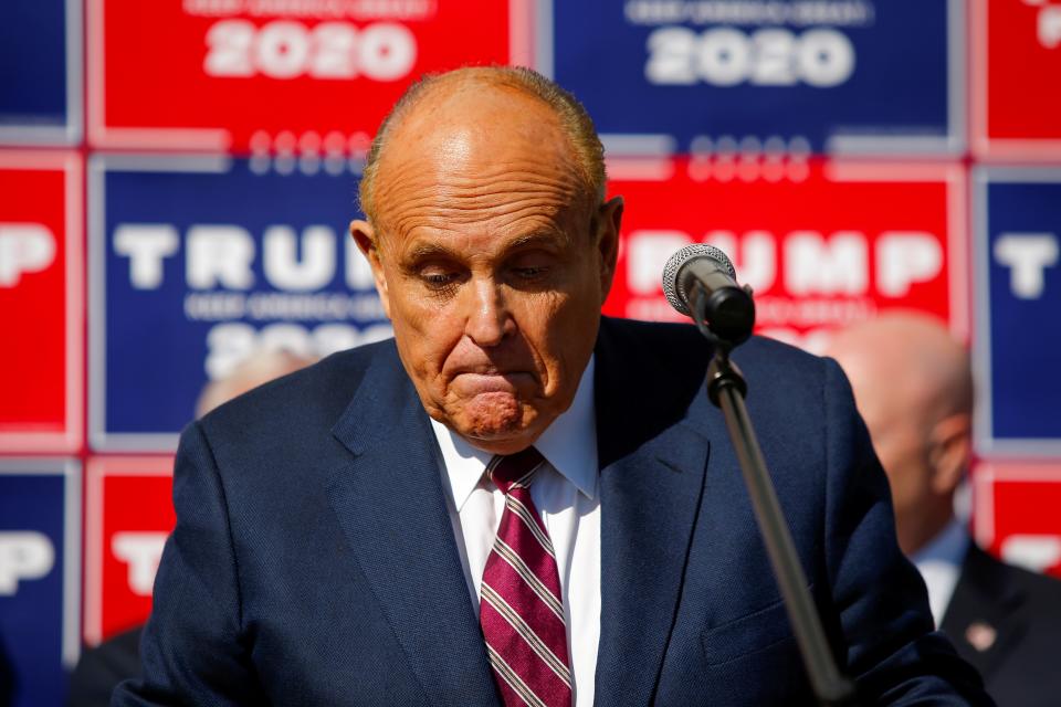 <p>Rudy Giuliani at a press conference in Philadelphia after Joe Biden was declared to have won the US election </p> (REUTERS)