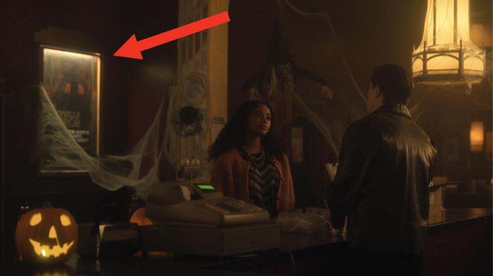an amityville horror poster in the orpheum in pretty little liars original sin