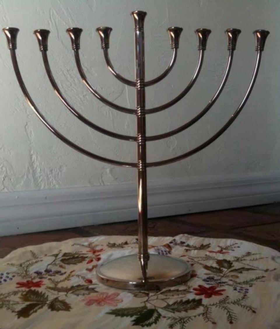 WPLG reporter Glenna Milberg bought Bernie Madoff’s menorah at a government auction of the swindler’s possessions.