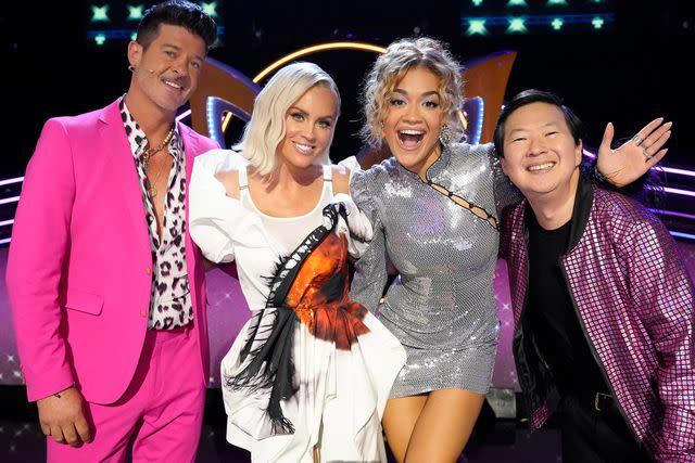 <p>Michael Becker / FOX</p> 'The Masked Singer' season 11 judges (from left) Robin Thicke, Jenny McCarthy-Wahlberg, Rita Ora and Ken Jeong