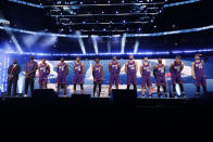 The World Team is introduced at the NBA Rising Stars basketball game in Chicago, Friday, Feb. 14, 2020. (AP Photo/Nam Y. Huh)