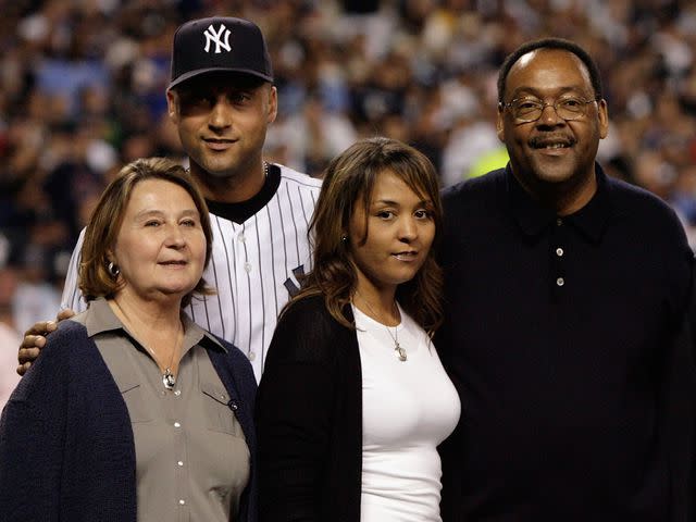 <p>Jim McIsaac/Getty</p> Derek Jeter with his father Charles, mother Dorothy, and sister Sharlee in 2008