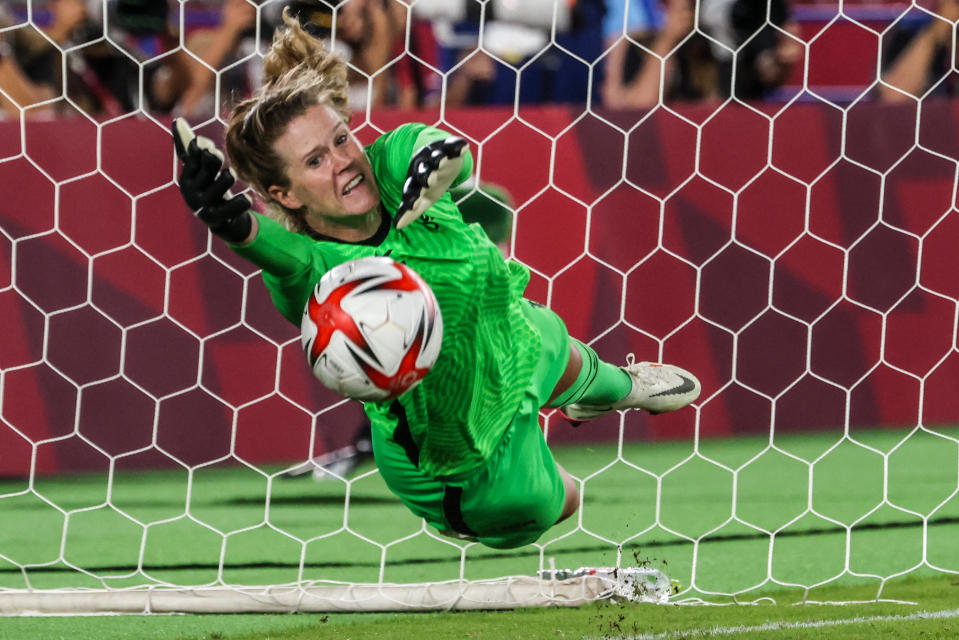 Yokohama, Japan, Friday, July 30, 2021 - Team United States goalkeeper Alyssa Naeher (1) makes a save on the Team Netherlands forward Vivianne Miedema (9), the first of two saves in a shootout victory over Netherlands in the Tokyo 2020 Olympics Womens Football Quarterfinal at International Stadium Yokohama. (Robert Gauthier/Los Angeles Times via Getty Images)