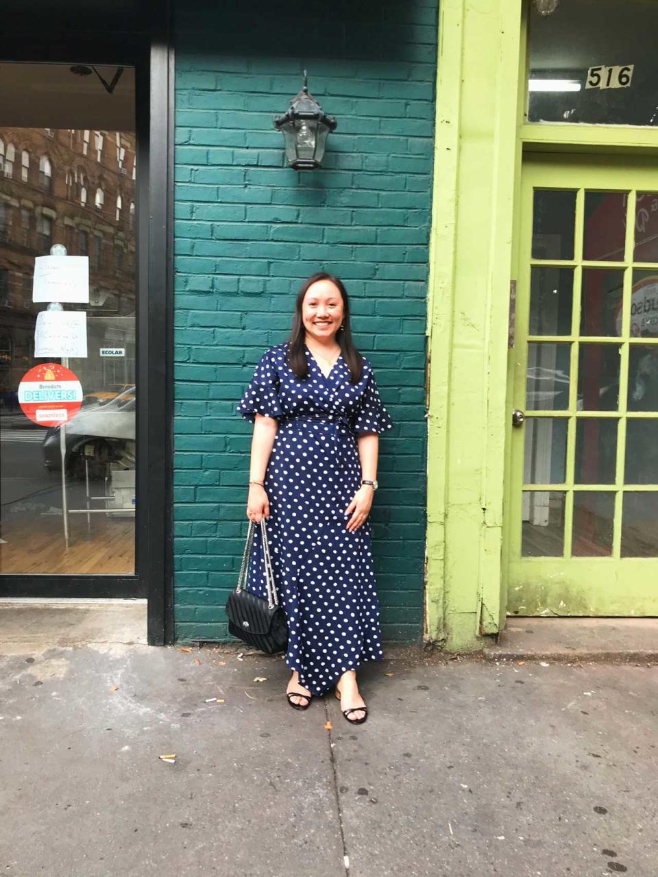 Yahoo Lifestyle Fashion Editor Julie Tong wears Kitri’s Eliana Polka Dot Wrap Dress in New York City. (Photo: Julie Tong)