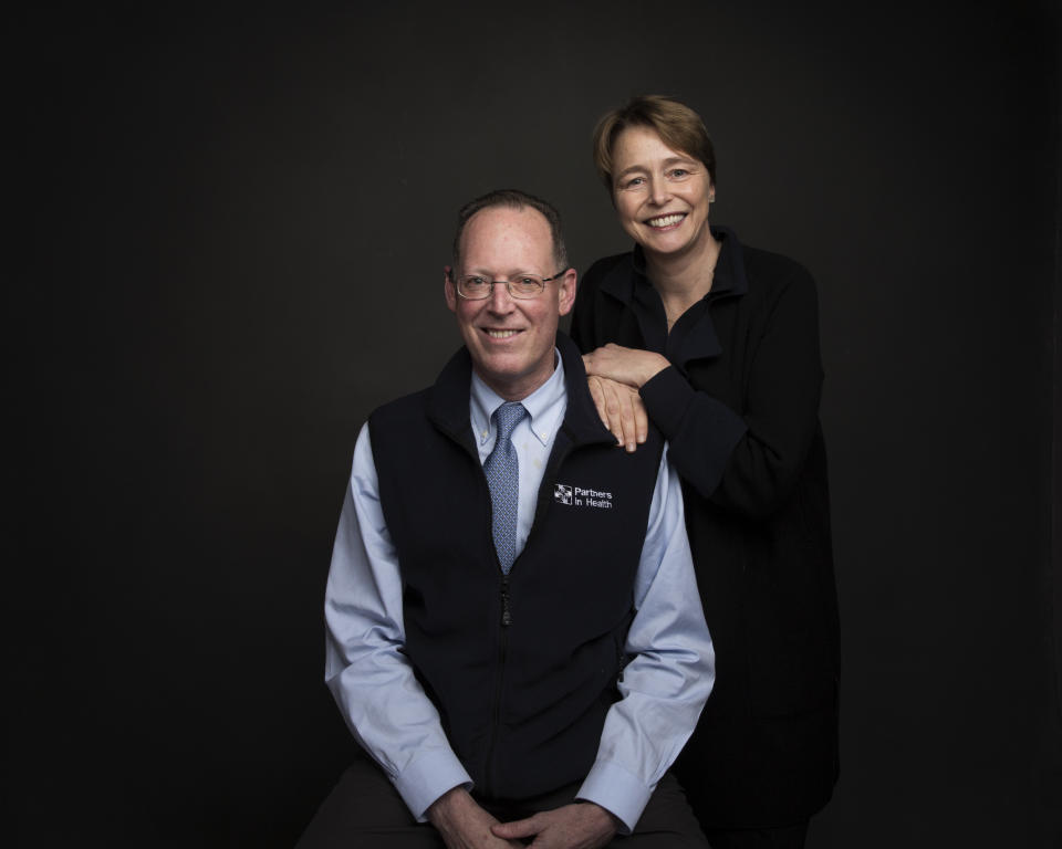 Dr. Paul Farmer, left, and Ophelia Dahl pose for a portrait to promote the film, "Bending the Arc", at the Music Lodge during the Sundance Film Festival on Sunday, Jan. 22, 2017, in Park City, Utah. (Photo by Taylor Jewell/Invision/AP)