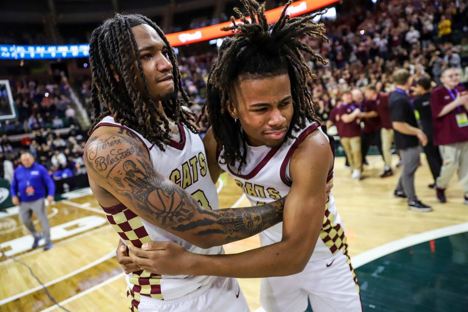 Niles Brandywine’s Jaremiah Palmer and Nylen Goins embrace one another with tears after Brandywine's 56-48 win in the MHSAA Division 3 boys basketball state final on Saturday, March 16, 2024, at Breslin Center.