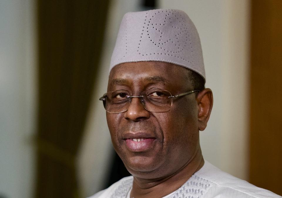 Senegal President Macky Sall poses before an interview with The Associated Press at the presidential palace in Dakar, Senegal, Friday, Feb. 9 , 2024. (AP Photo/Sylvain Cherkaoui)