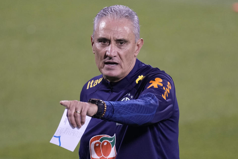 Brazil's head coach Tite attends a training session at the Grand Hamad stadium in Doha, Qatar, Monday, Nov. 21, 2022. Brazil will play their first match in the World Cup against Serbia on Nov. 24. (AP Photo/Andre Penner)