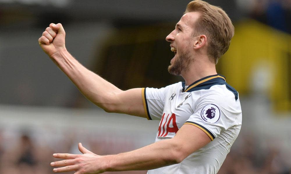 Harry Kane celebrates after completing his hat-trick against Stoke