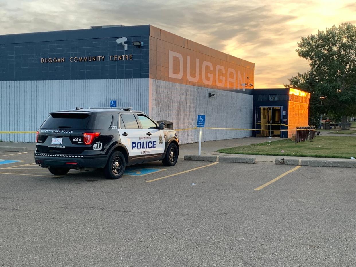 Police officers responded to a report of a shooting at a community hall near 37th Avenue and 106th Street around 4 a.m. on Aug. 29, 2021. (Scott Neufeld/CBC - image credit)