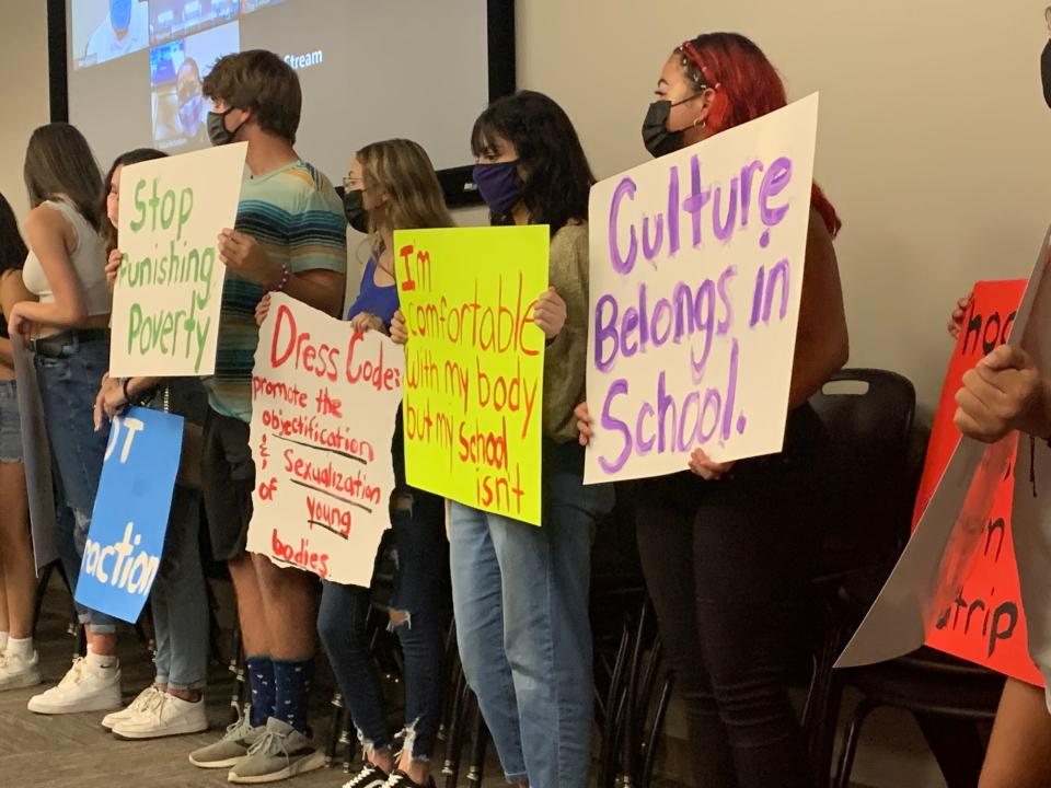 Students at Northside High School in Fort Smith, Arkansas, protest the school's dress code at a board meeting in August. Students say the rules are more strictly enforced this year.