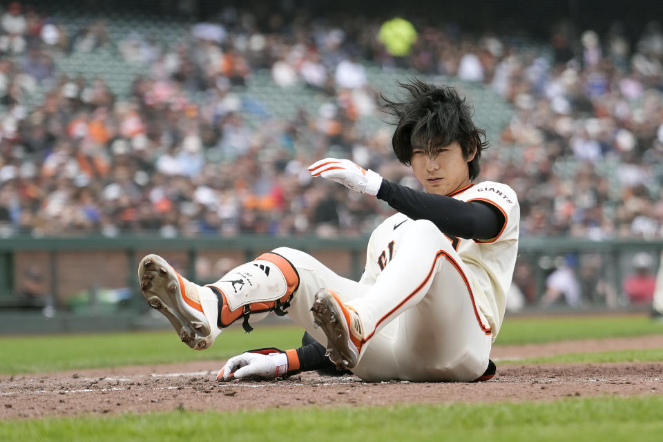 San Francisco Giants' Jung Hoo Lee reacts after avoiding a pitch against the New York Mets during the eigh inning of a baseball game in San Francisco, Wednesday, April 24, 2024. (AP Photo/Jeff Chiu)