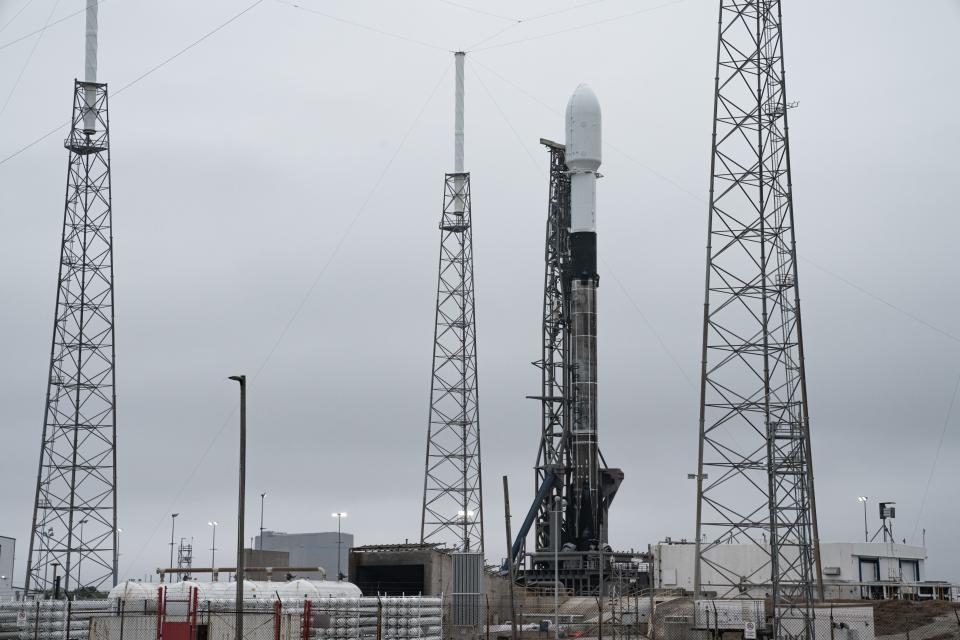 A SpaceX Falcon 9 rocket stands at Cape Canaveral Space Force Station Launch Complex 40 with 143 payloads for the Transporter-1 mission on Saturday, Jan. 23, 2021.