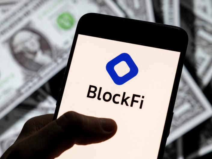 In this photo illustration, the cryptocurrency exchange trading platform Blockfi logo is seen on an Android mobile device screen with the currency of the United States dollar icon.