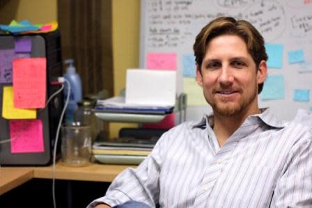 Ryan Sprissler, staff scientist and manager of the University of Arizona Genetics Core and a University of Arizona Ph.D. candidate, researches genetic mysteries in Tucson Ariz. (Photograph by Susan E. Swanberg).