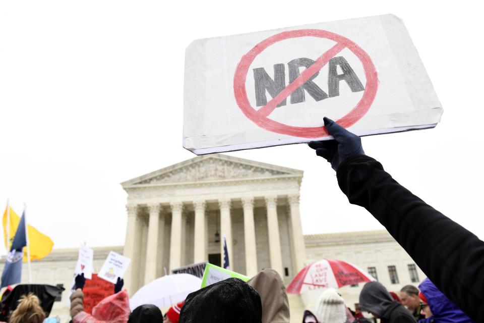 Protesters against the NRA gather outside the Supreme Court in Washington, D.C., in Dec. 2019.