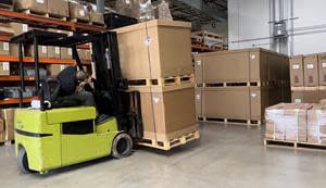 Mr. King operates a fork lift to move Volcon vehicles into the company warehouse for distribution.