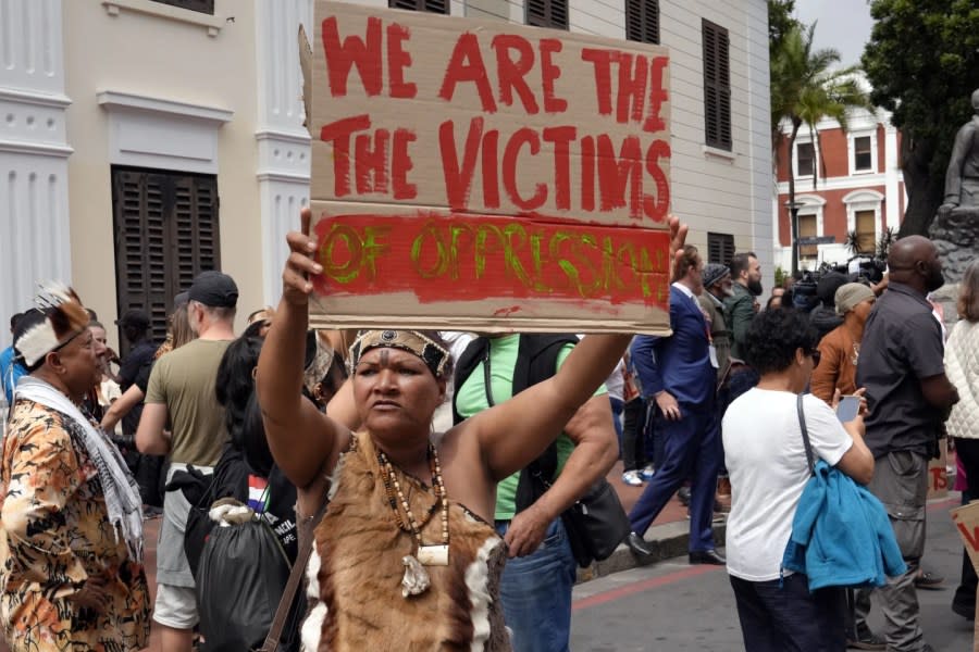 Khoisan protesters protest during the visit of King Willem Alexander and Queen Maxima of the Netherlands at the Slave Lodge in Cape Town, South Africa, Friday, Oct. 20, 2023. (AP Photo/Nardus Engelbrecht)