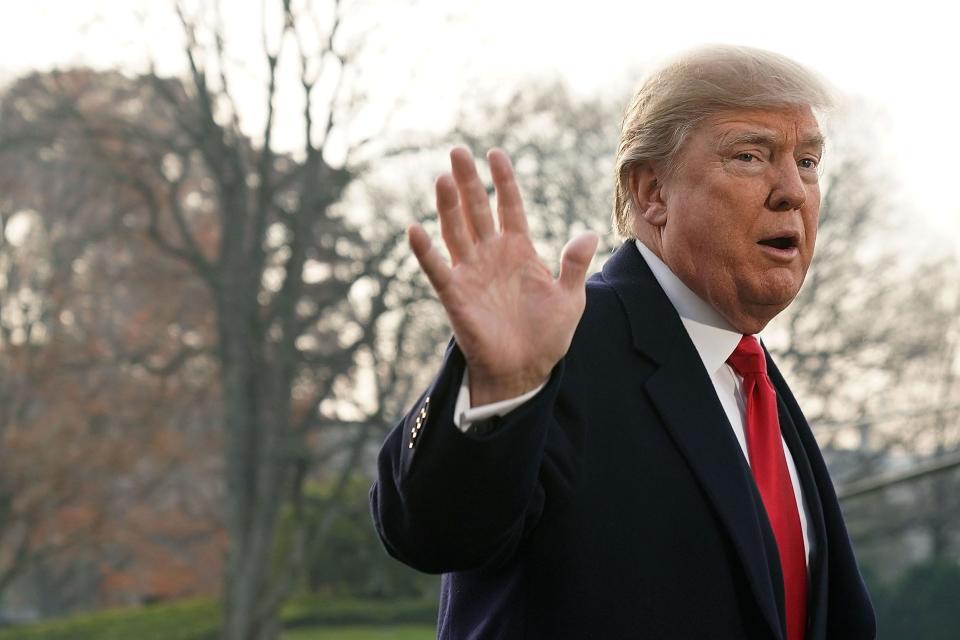 Donald Trump, waving on the White House lawn.