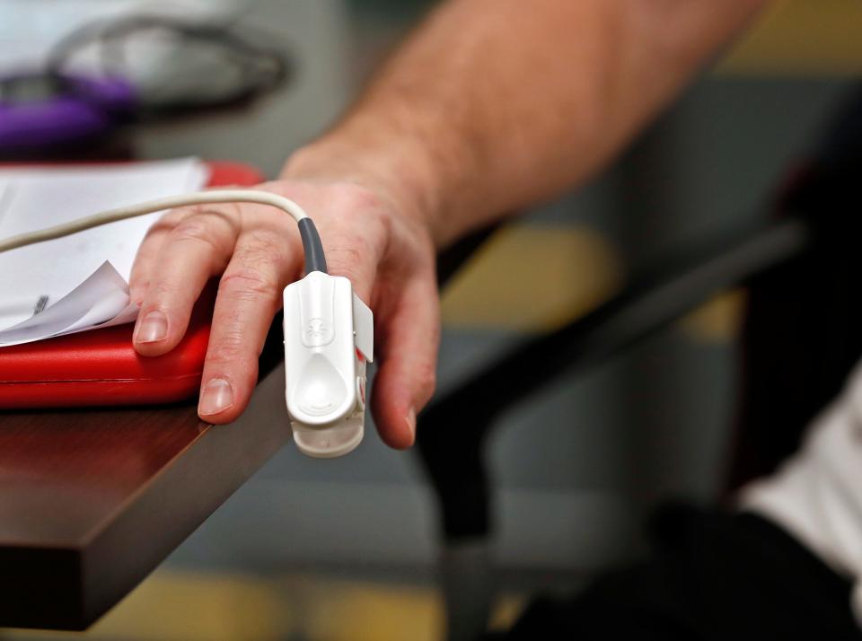 A patient has his oxygen levels tested with a pulse oximeter on March 23, 2021, at IU Health Methodist Hospital's Center of Life for Thoracic Transplant in Indianapolis.