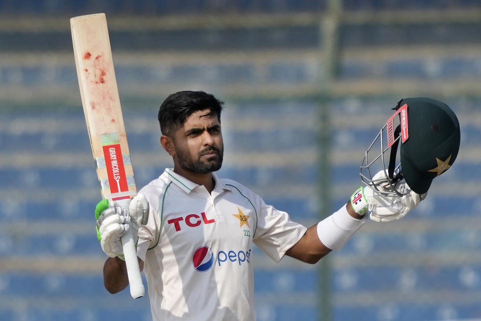 Pakistan's Babar Azam celebrates after scoring century during the first day of first test cricket match between Pakistan and New Zealand, in Karachi, Pakistan, Monday, Dec. 26, 2022. (AP Photo/Fareed Khan)