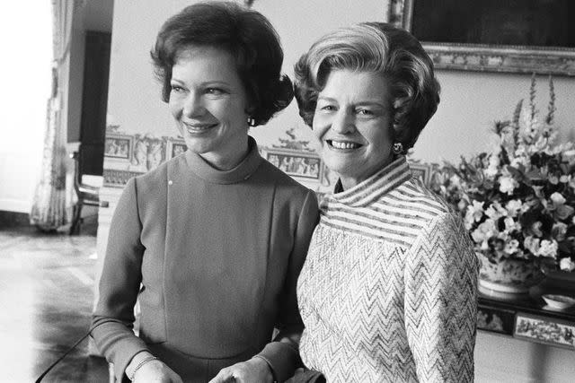 <p>David Hume Kennerly/Getty</p> Rosalynn Carter and Betty Ford on the day the Carters moved into the White House