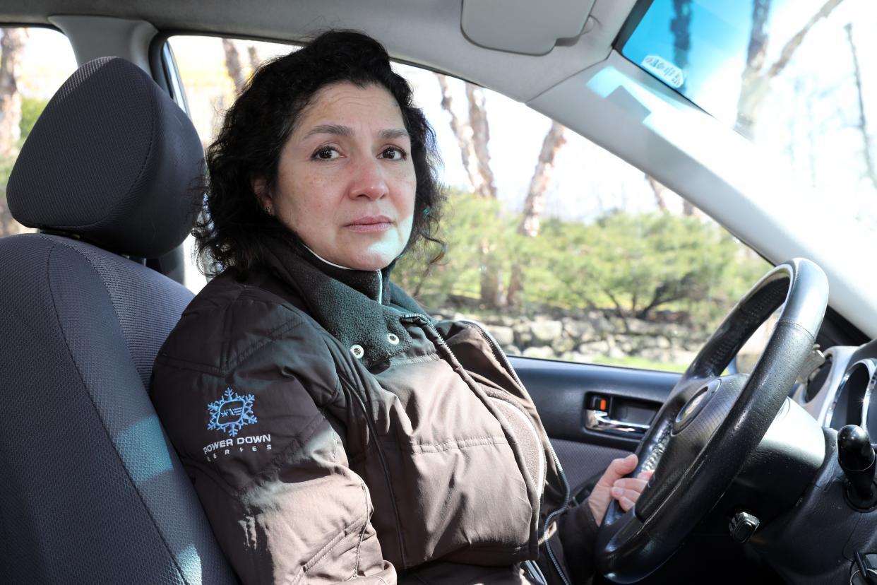 Sandie Ortiz, whose car was struck by a Yonkers police SUV in June, is pictured in her car at home in Ossining March 29, 2024. Ortiz has been trying to get the police insurance to cover the $3,000 in damages to her car.
