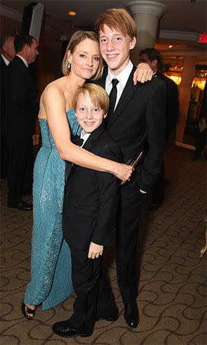 Jodie with her sons Kit (C) and Charles (R). Credit: Getty Images