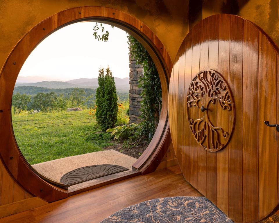 Images inside "Dragons Knoll," a subterranean short-term rental offered at Earth & Sky Dwellings.