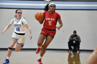 Sacred Heart Academy guard ZaKiyah Johnson dribbles during a high school basketball game against Mercy Academy in Louisville, Ky., Sunday, Feb. 11, 2024. The junior wing ranked as a top-five overall prospect for next season has pared her list down to a dozen schools, an elite group that includes defending national champion LSU, current No. 1 and two-time champ South Carolina and of course, nearby Louisville. (AP Photo/Timothy D. Easley)