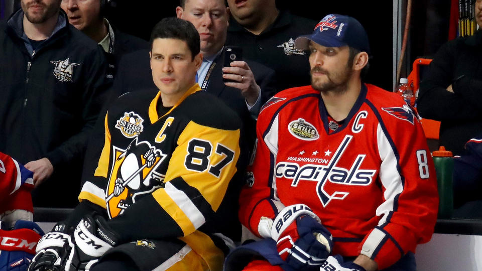 Will Sidney Crosby, left, and Alex Ovechkin both miss the playoffs this year? (Photo by Bruce Bennett/Getty Images)