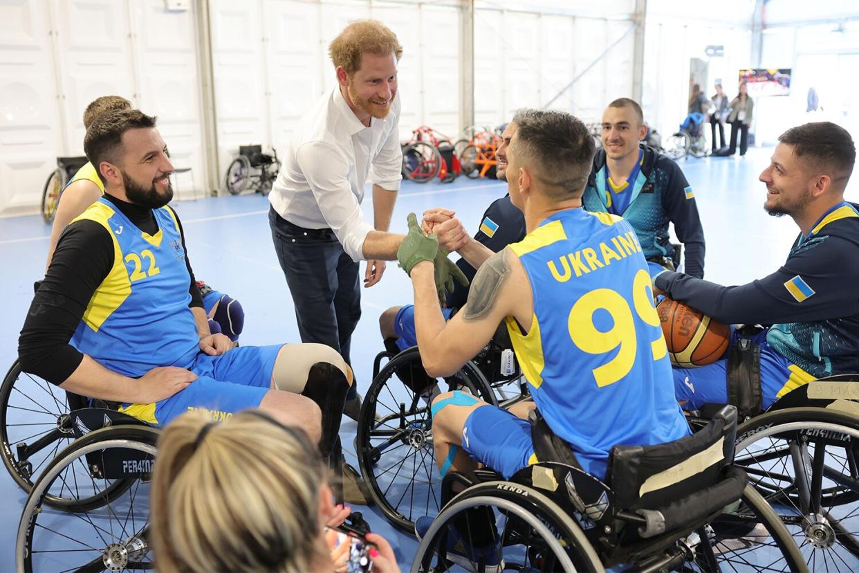 Prince Harry, Duke of Sussex meets with the Wheelchair Basketball Team Ukraine during day six of the Invictus Games The Hague 2020 at Zuiderpark on April 21, 2022 in The Hague, Netherlands.